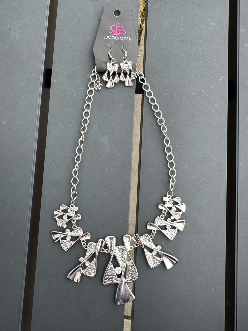 $12 or 3/$30! Paparazzi Silver Sculptural Fan Charm Necklace and Earring Set